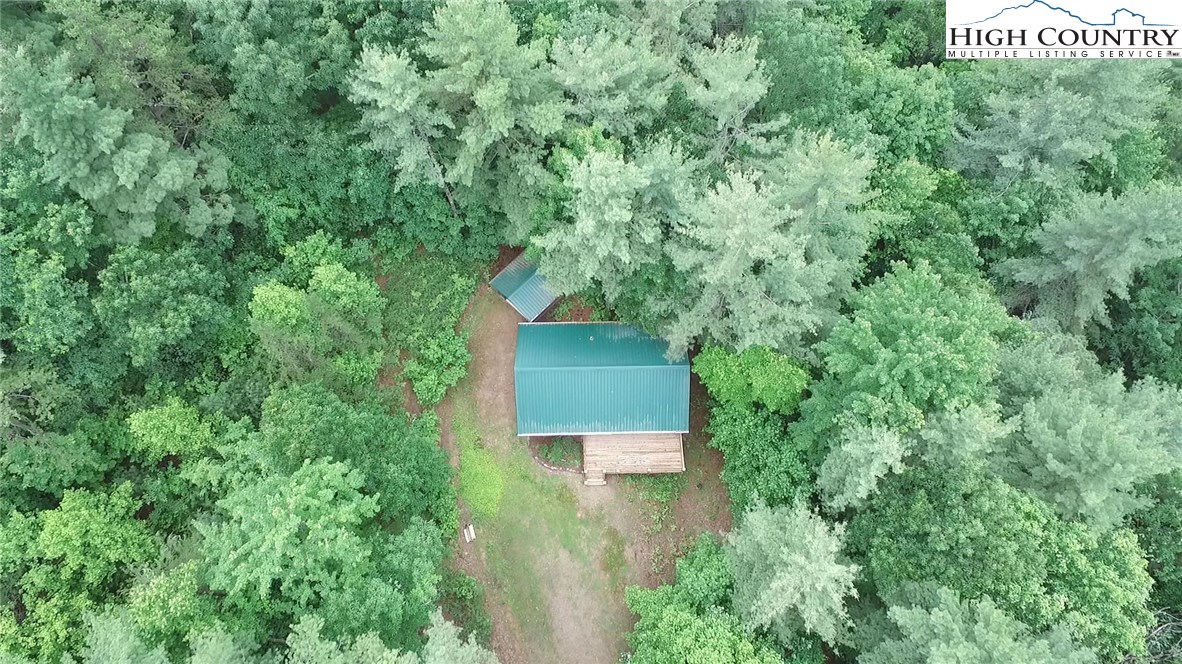 605 Wolf Pen Road Purlear, NC 28665 - Photo 28 of 50 an aerial view of a house with a yard