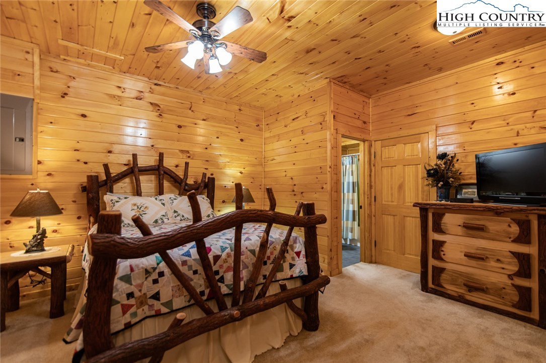 605 Wolf Pen Road Purlear, NC 28665 - Photo 30 of 50 a view of a livingroom with furniture