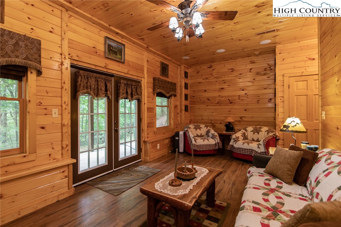 605 Wolf Pen Road Purlear, NC 28665 - Photo 40 of 50 a living room with furniture and wooden floor