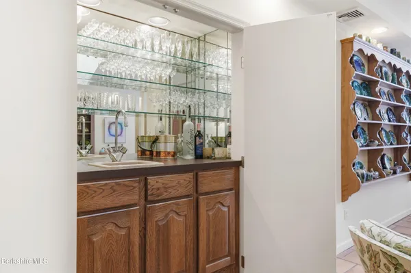 a bathroom with a double vanity sink mirror and double