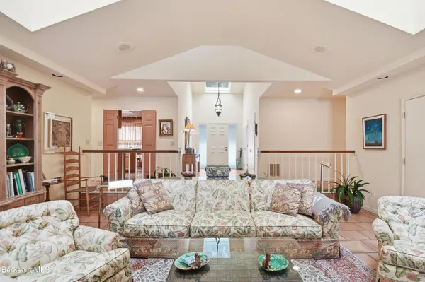 a kitchen with stainless steel appliances granite countertop a stove and a refrigerator
