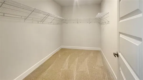 a view of a room with racks on the wall