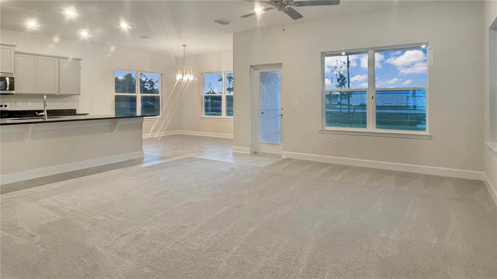 4086 Sagefield Drive Harmony, FL 34773 - Photo 3 of 16 a view of an empty room with a window