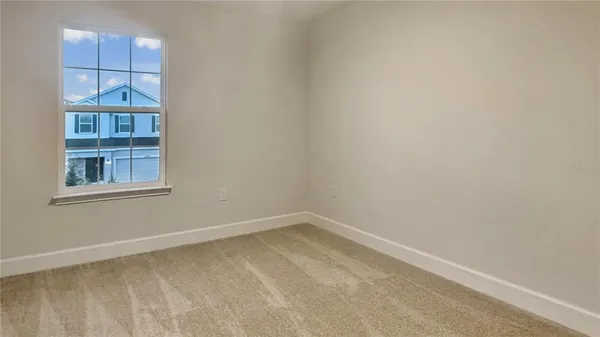 a view of a small space with racks on the wall