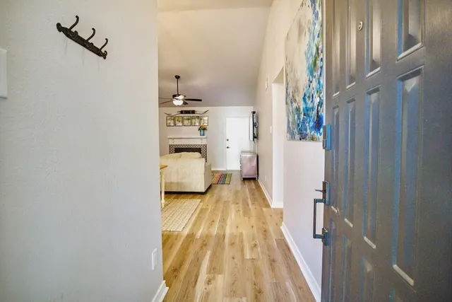 a view of bedroom with a bed and a window