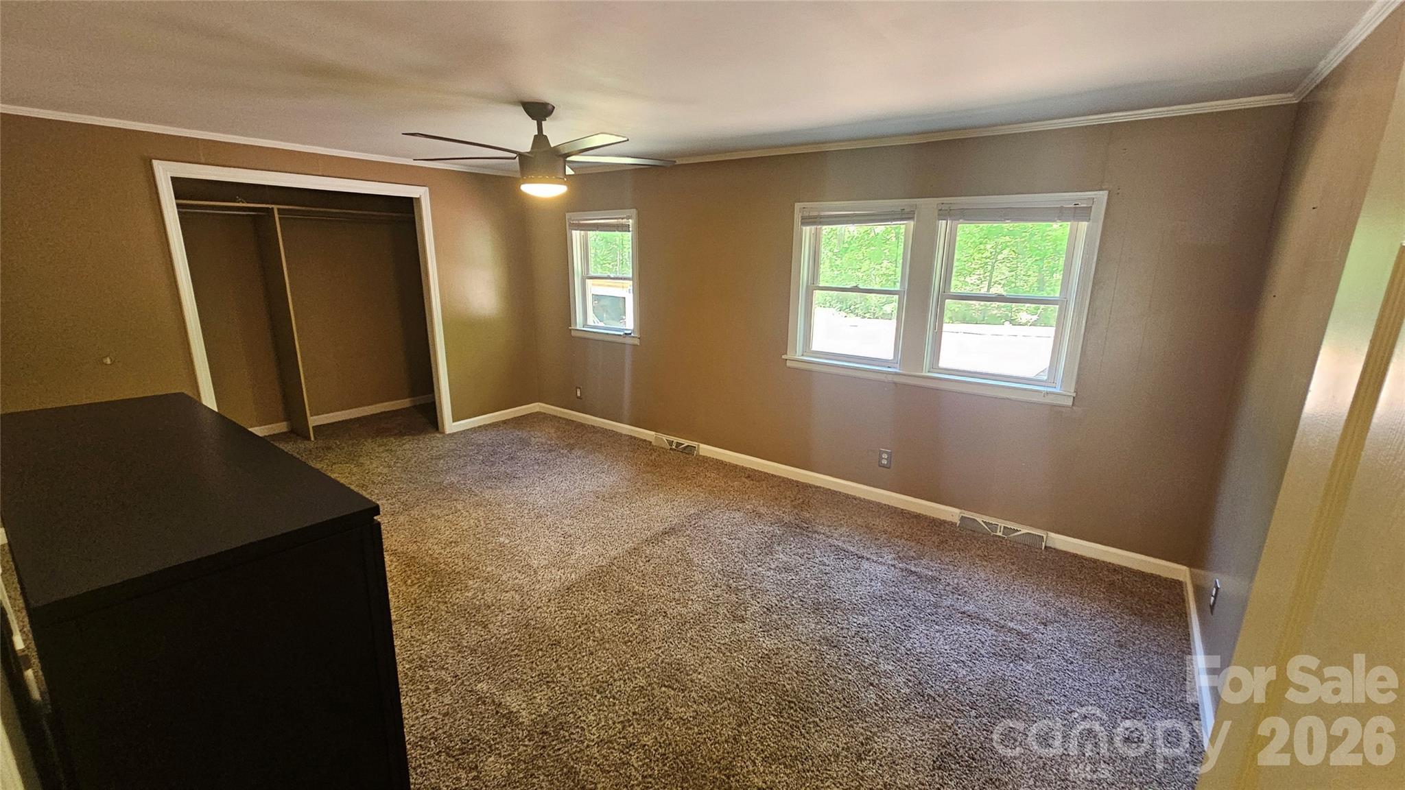 130 Pine State Road Troutman, NC 28166 - Photo 16 of 21 an empty room with windows and closet