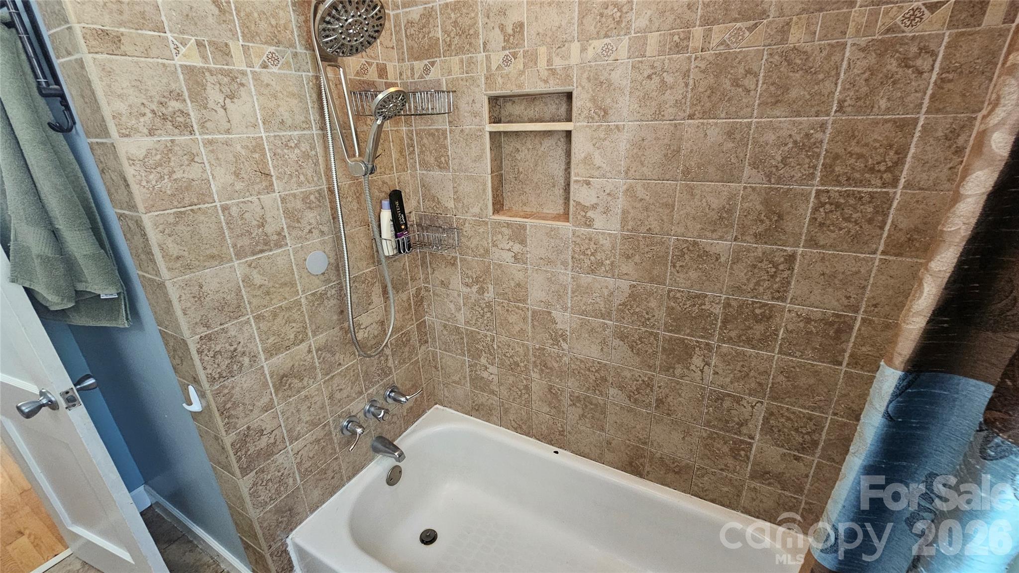 130 Pine State Road Troutman, NC 28166 - Photo 19 of 21 a bathroom with a bathtub