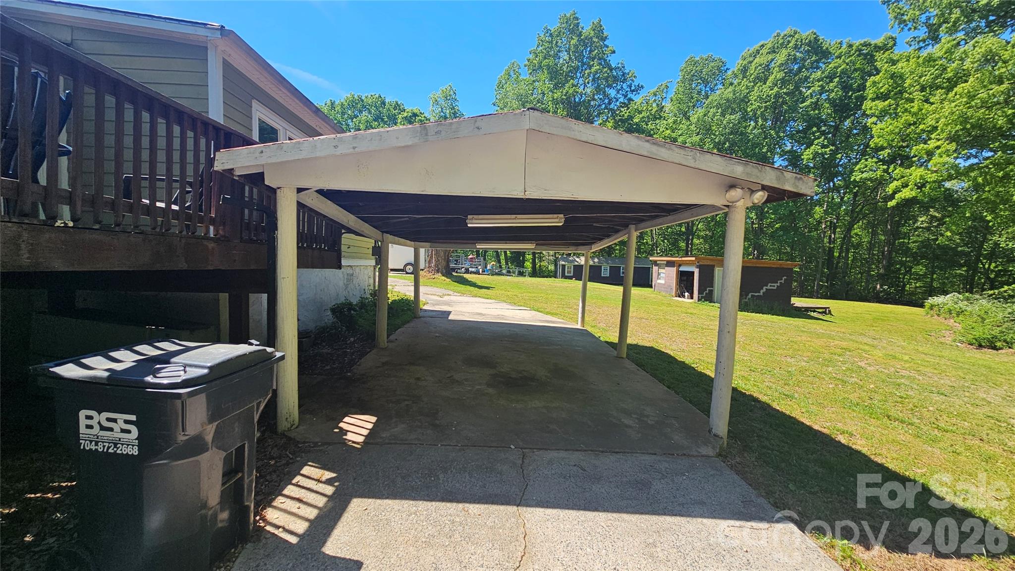 130 Pine State Road Troutman, NC 28166 - Photo 7 of 21 a patio with table and chairs