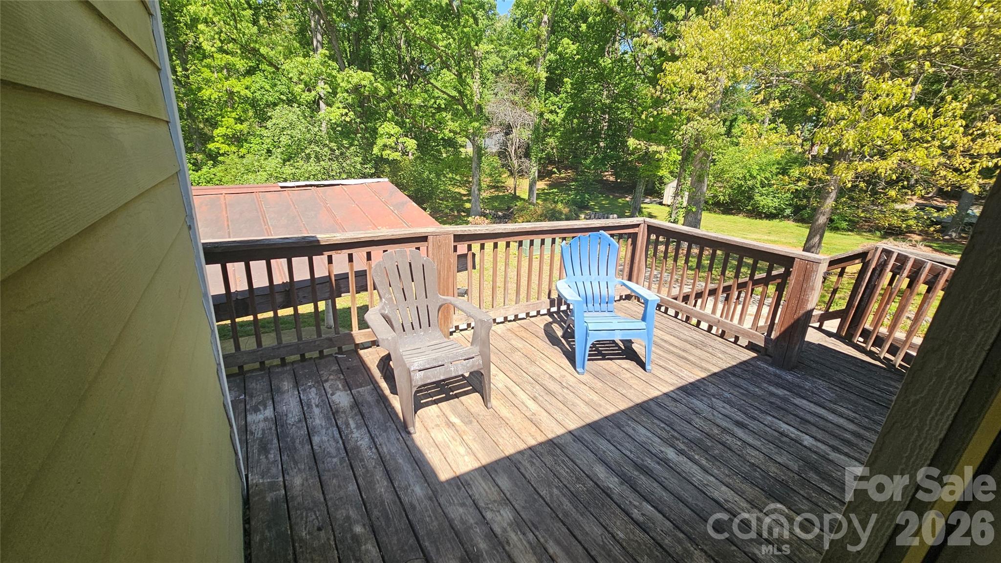 130 Pine State Road Troutman, NC 28166 - Photo 9 of 21 a view of balcony with wooden floor and seating space