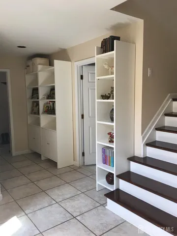 a view of a hardwood & utility room