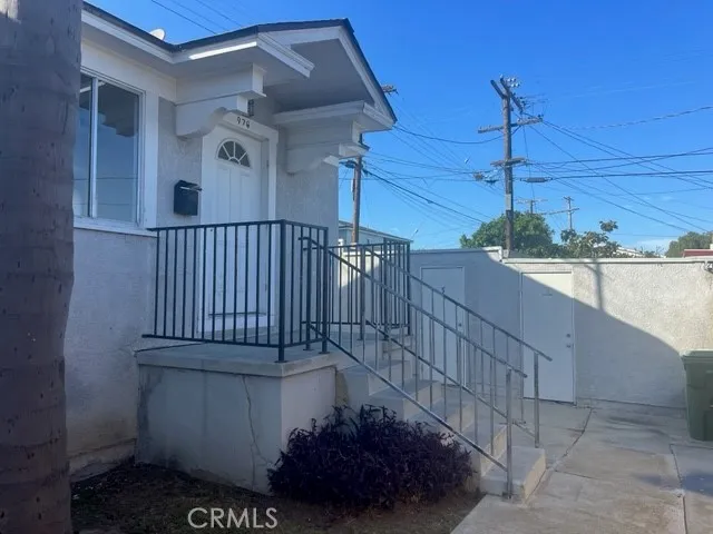 a view of a balcony with a potted plant