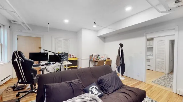 a room with furniture and a window