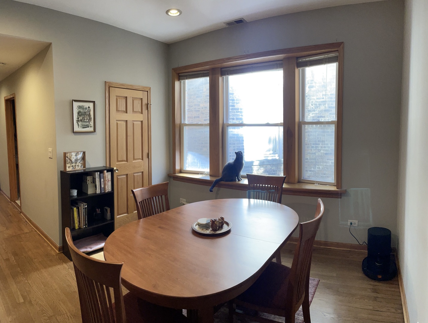 2755 West Logan Boulevard, Unit 2 Chicago, IL 60647 - Photo 12 of 24 a dining room with furniture and window