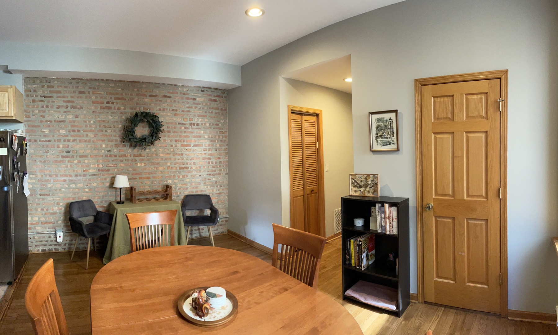 2755 West Logan Boulevard, Unit 2 Chicago, IL 60647 - Photo 13 of 24 a bedroom with a bed and a table in it