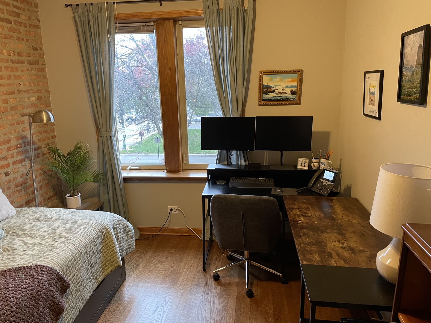 2755 West Logan Boulevard, Unit 2 Chicago, IL 60647 - Photo 16 of 24 a bedroom with a bed and a window