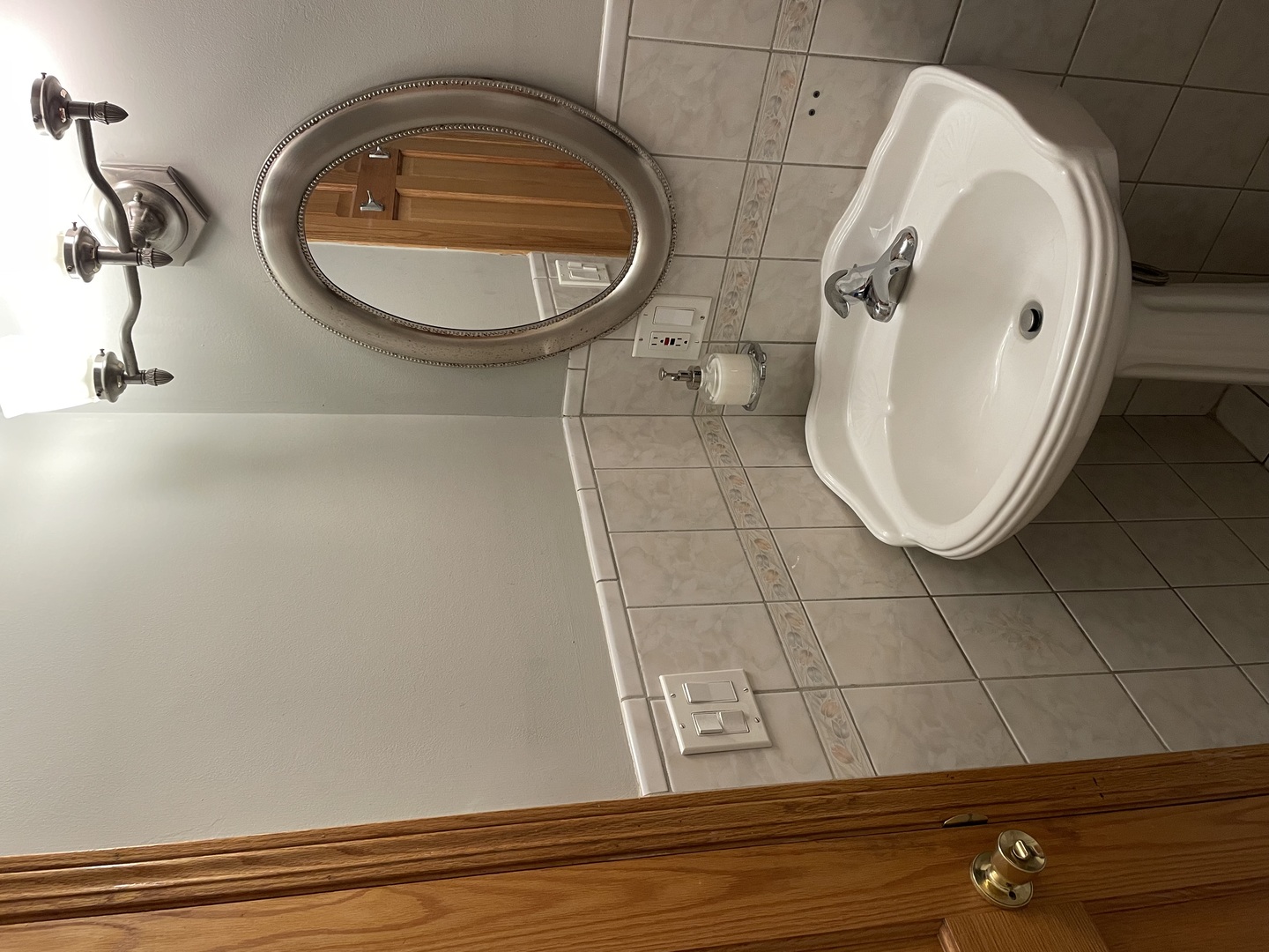 2755 West Logan Boulevard, Unit 2 Chicago, IL 60647 - Photo 19 of 24 a bathroom with a sink and mirror