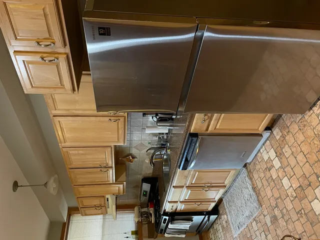 a view of storage and utility room with stairs