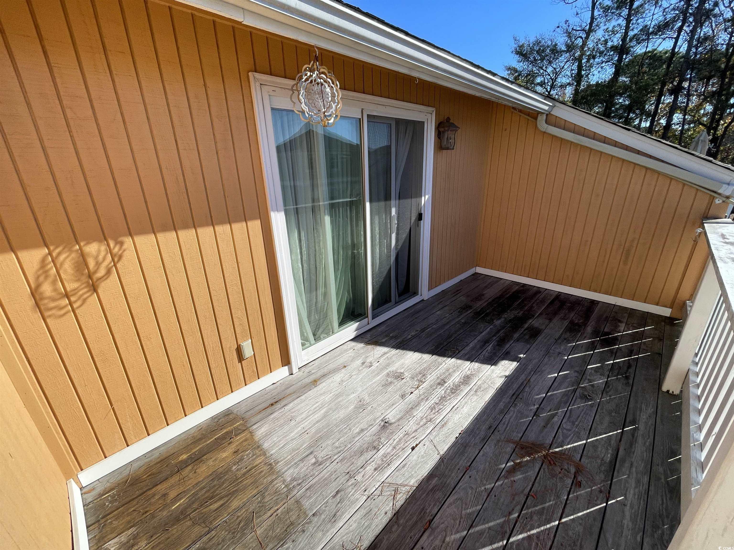1851 Fairway Ridge Drive, Unit 7E Surfside Beach, SC 29575 - Photo 21 of 29 View of wooden terrace