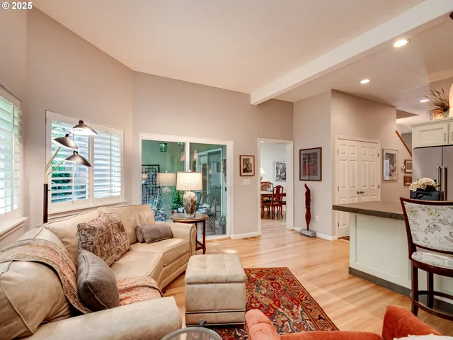a garden with a table and a chairs