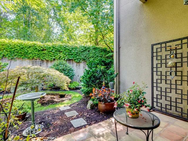 a view of a house with pool and garden