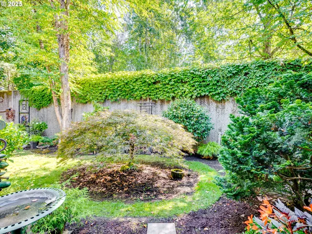 a bed room with a bed and a chair