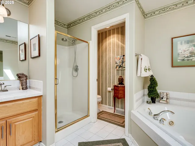 a bathroom with a sink vanity and mirror