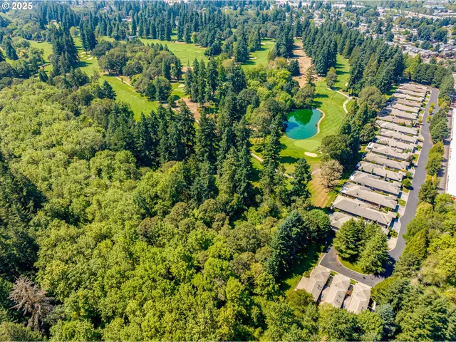 a view of garden with sitting area