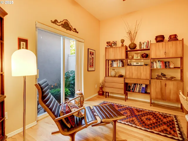 a kitchen with a refrigerator and a stove