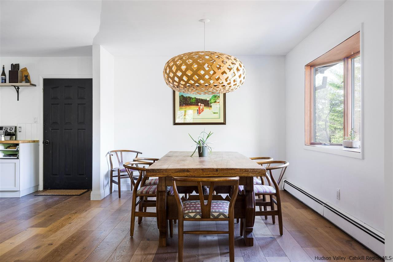1882 County Road Olivebridge, NY 12461 - Photo 12 of 35 a view of a dining room with furniture and wooden floor