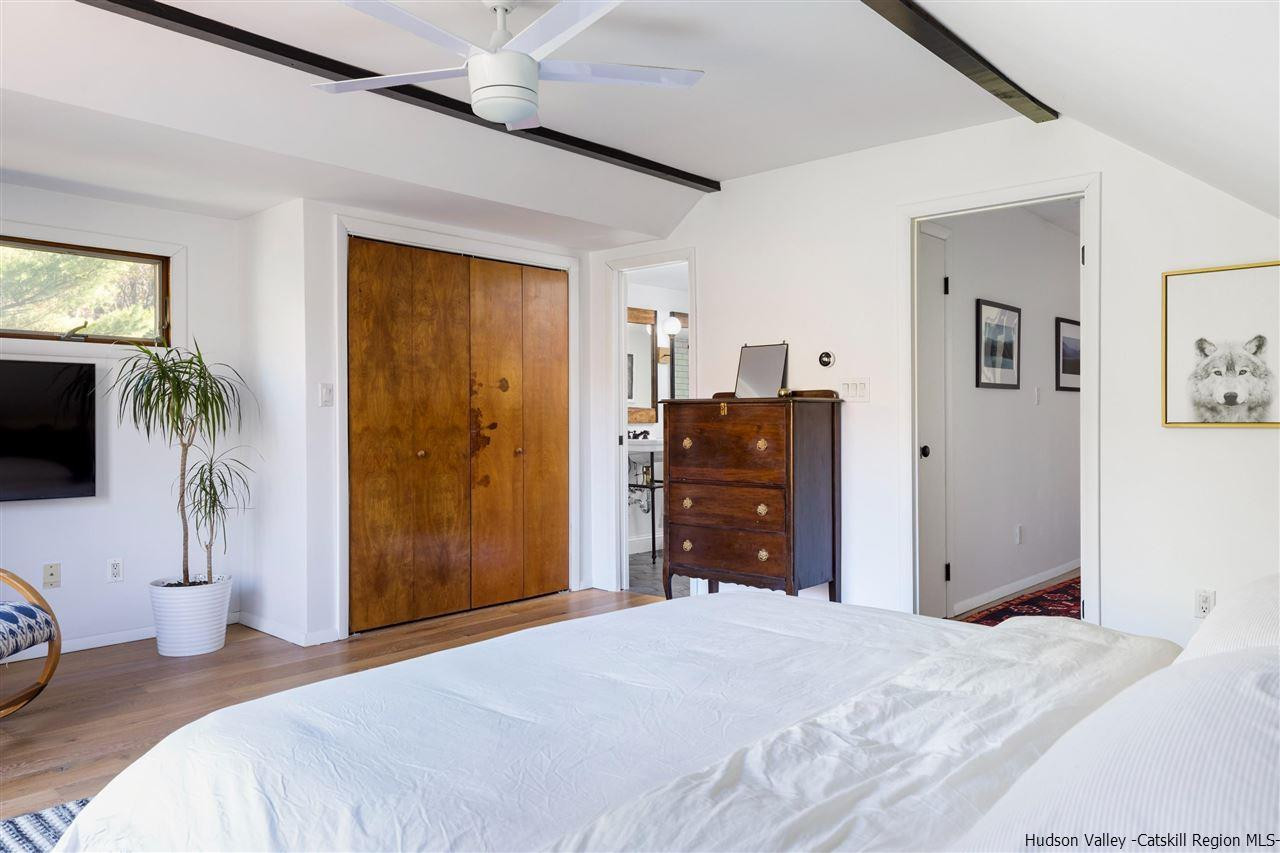 1882 County Road Olivebridge, NY 12461 - Photo 22 of 35 a bedroom with a bed and a television