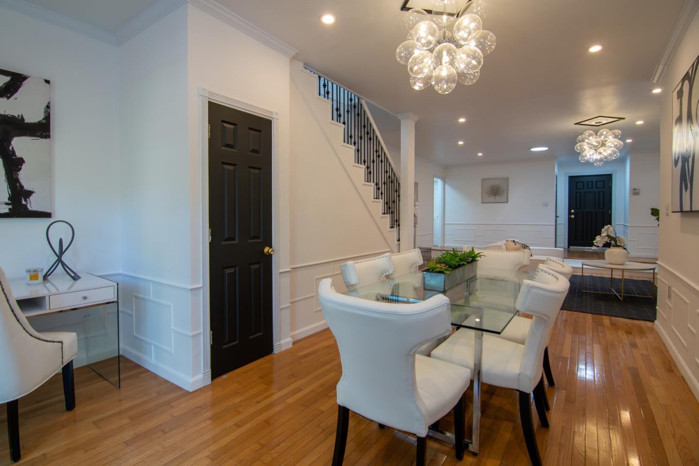 535 Sobrato Drive Campbell, CA 95008 - Photo 11 of 32 a living room with furniture and a chandelier