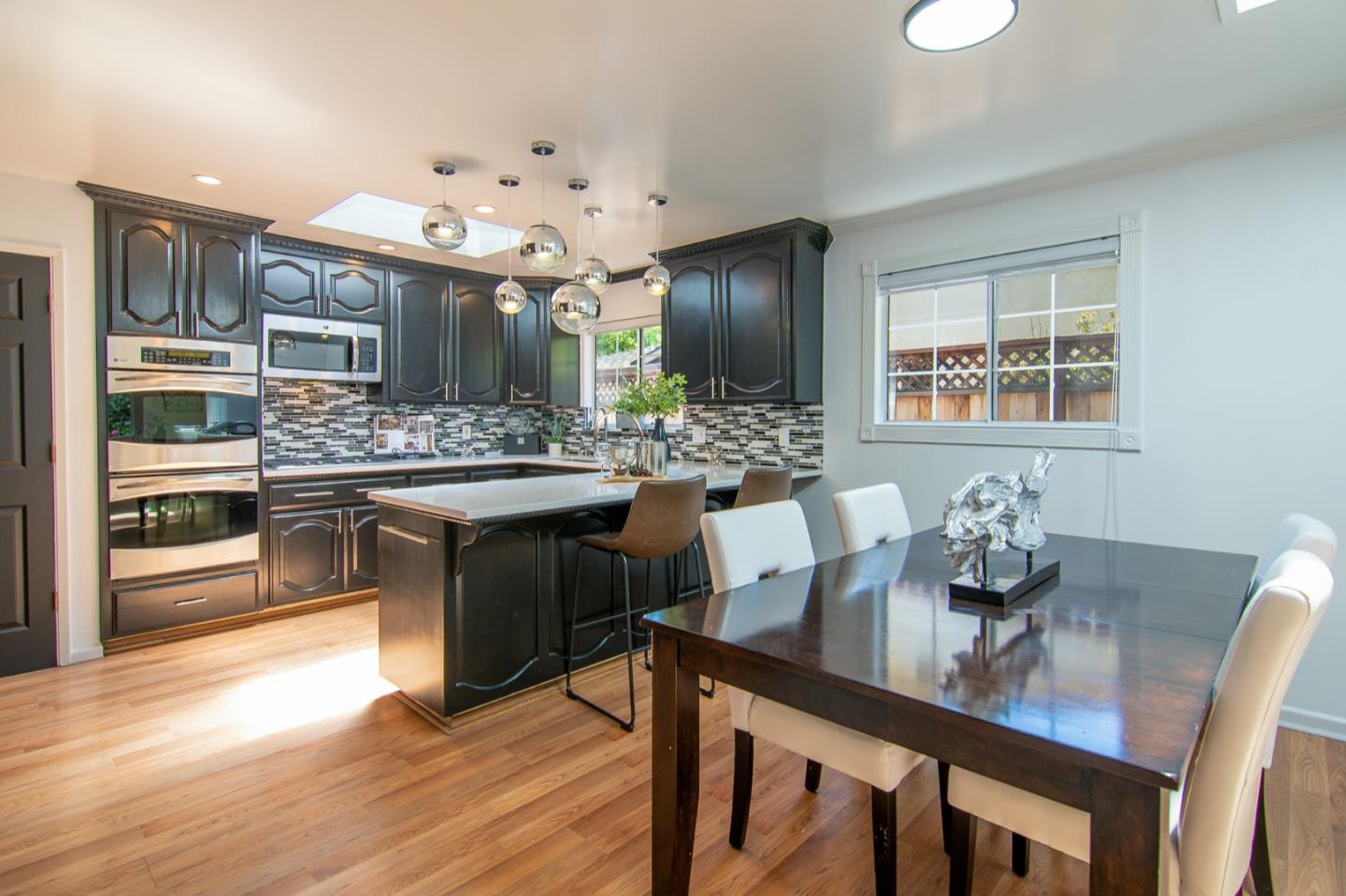 535 Sobrato Drive Campbell, CA 95008 - Photo 13 of 32 a dining table with a large window