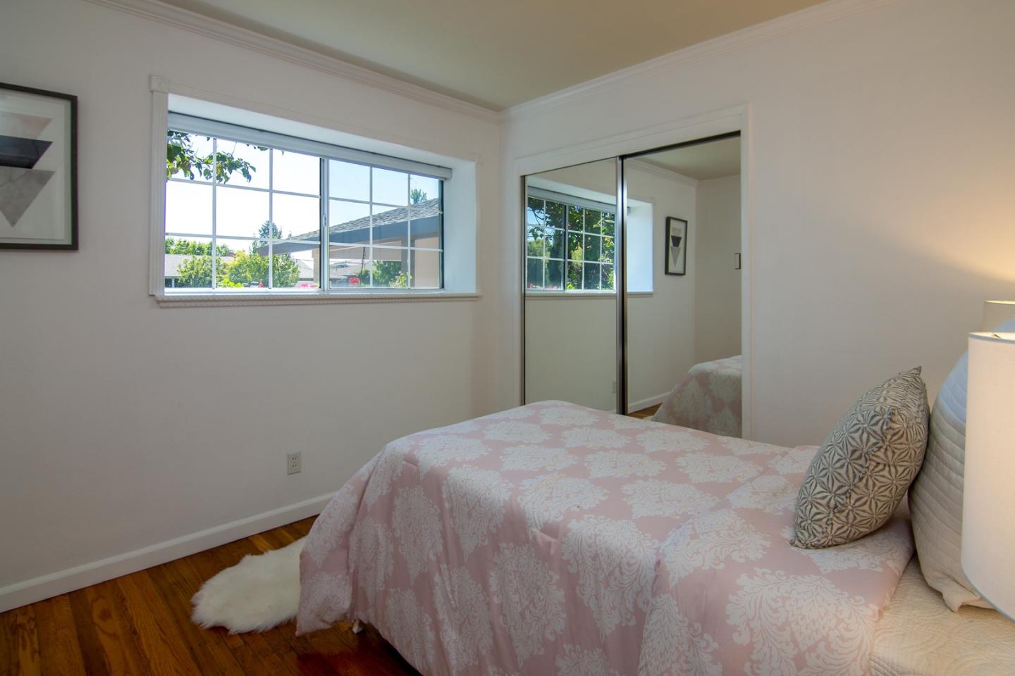 535 Sobrato Drive Campbell, CA 95008 - Photo 17 of 32 a bedroom with a bed and a window