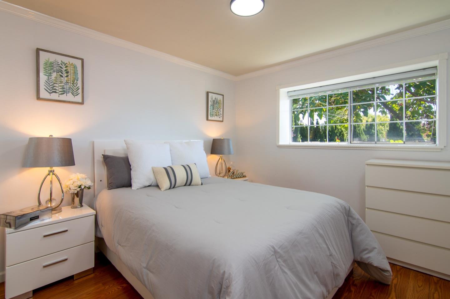 535 Sobrato Drive Campbell, CA 95008 - Photo 18 of 32 a bedroom with a bed and a window