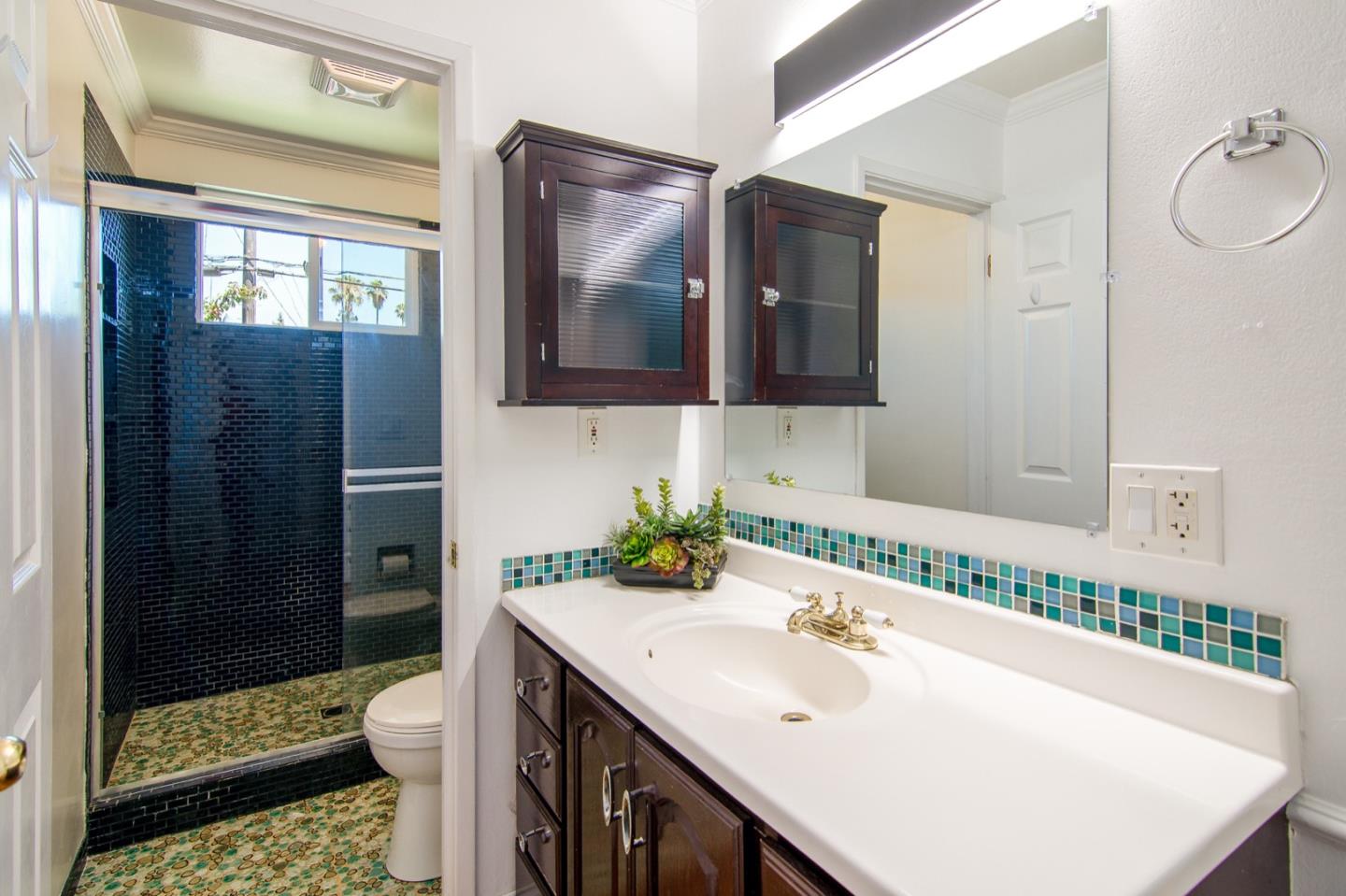 535 Sobrato Drive Campbell, CA 95008 - Photo 22 of 32 a bathroom with a sink a toilet and shower