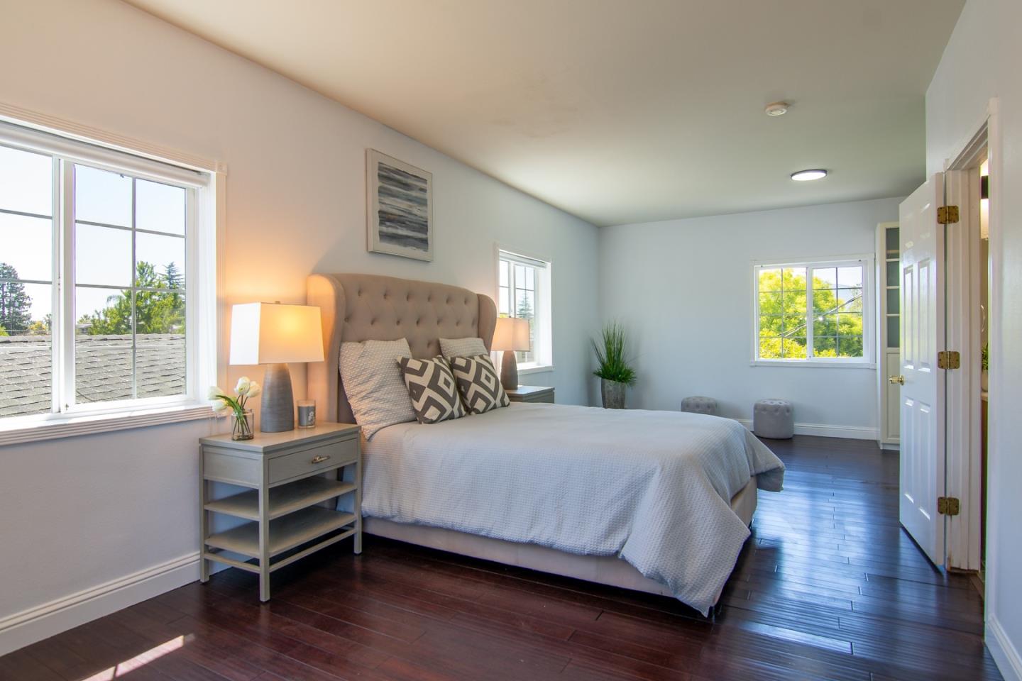 535 Sobrato Drive Campbell, CA 95008 - Photo 24 of 32 a bedroom with a bed and wooden floor