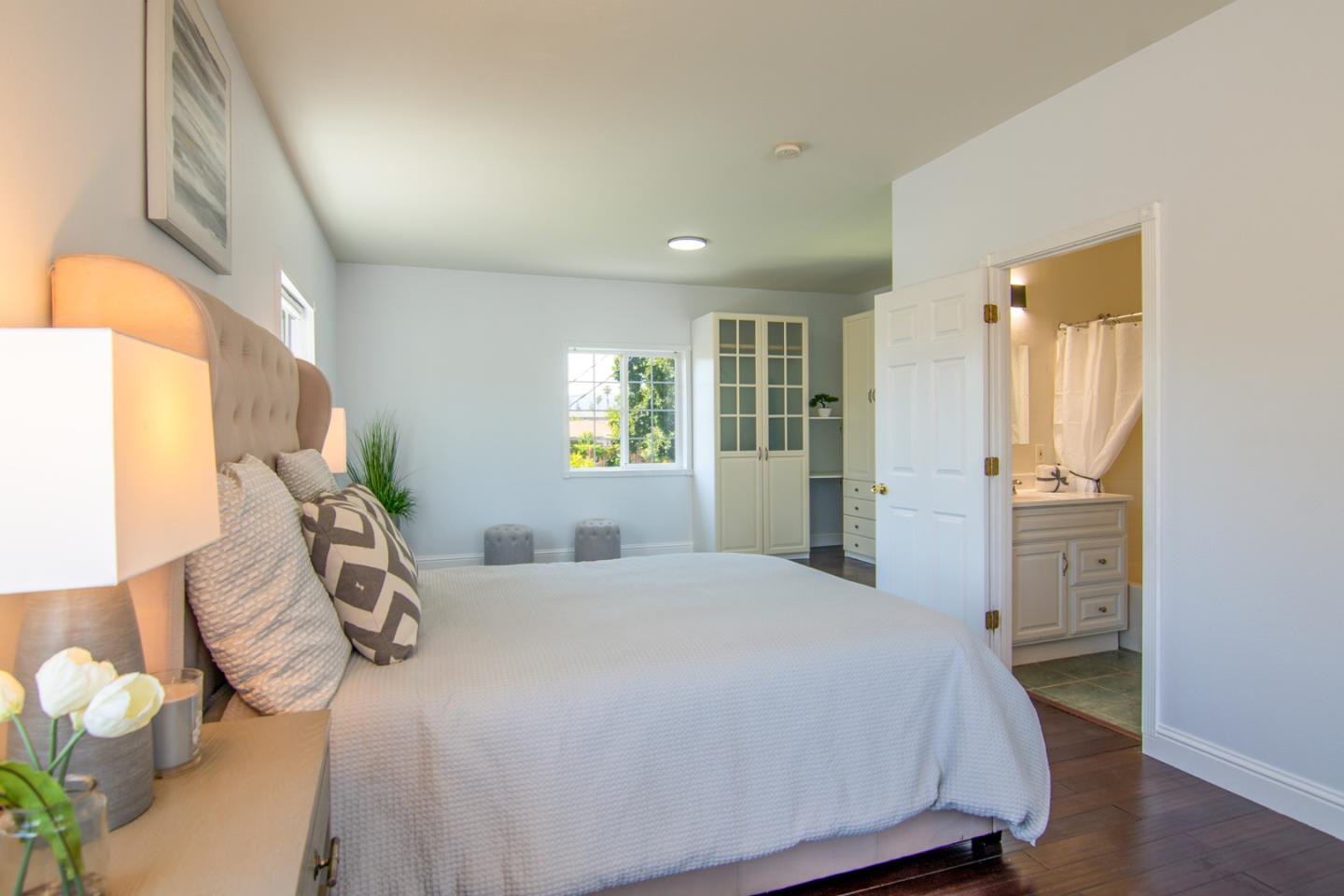 535 Sobrato Drive Campbell, CA 95008 - Photo 25 of 32 a bedroom with a large bed and a window