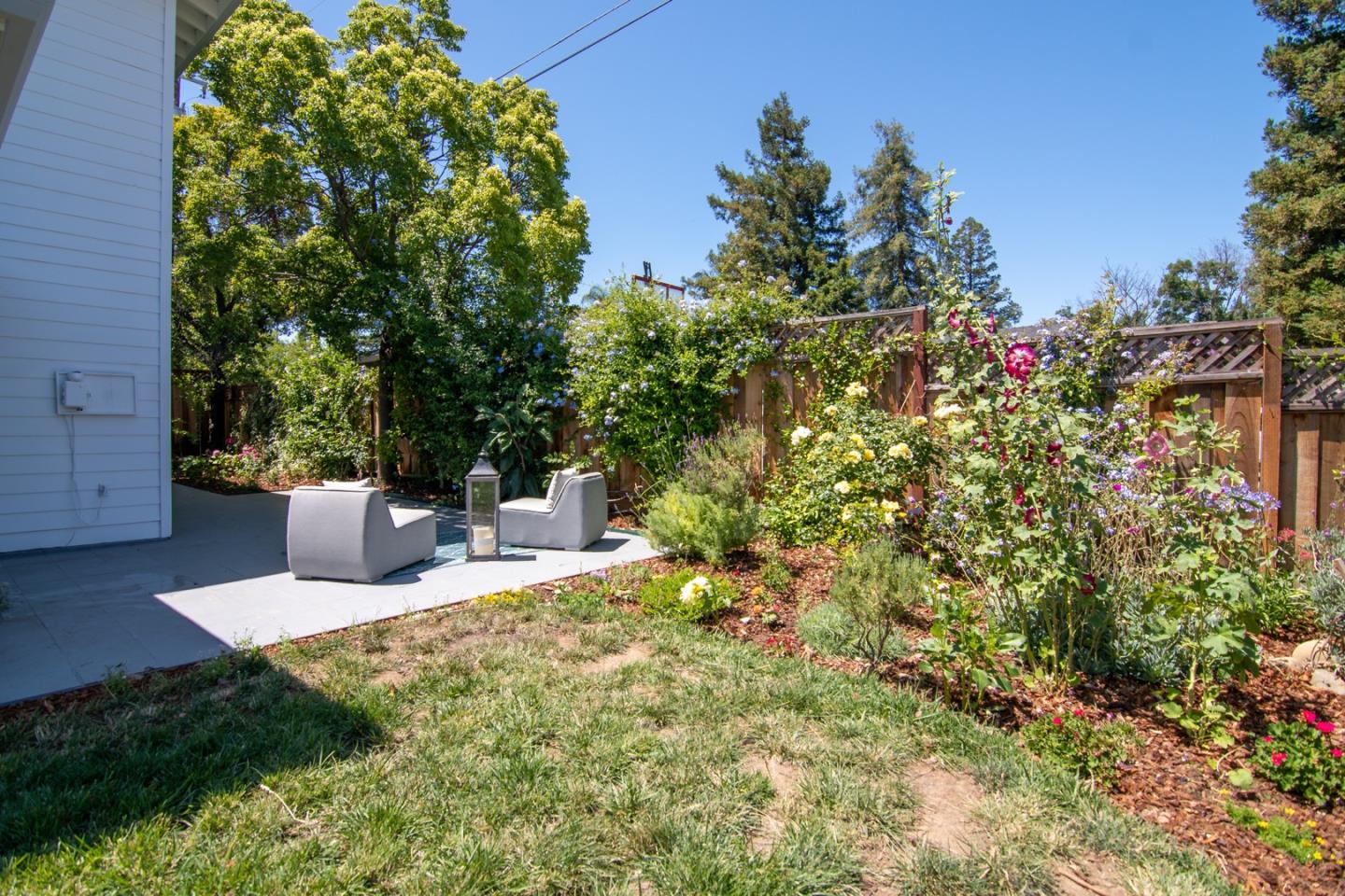 535 Sobrato Drive Campbell, CA 95008 - Photo 31 of 32 a view of a patio with table and chairs and potted plants