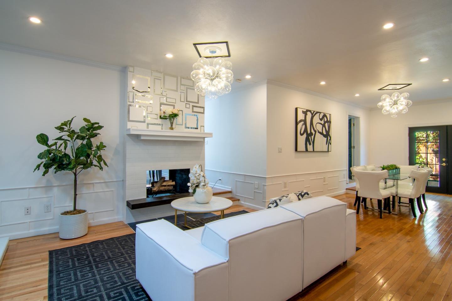 535 Sobrato Drive Campbell, CA 95008 - Photo 4 of 32 a living room with furniture potted plant and a fireplace