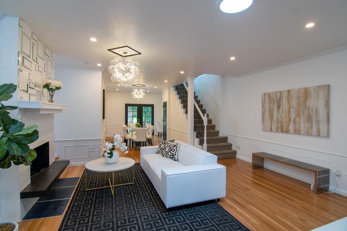 535 Sobrato Drive Campbell, CA 95008 - Photo 5 of 32 a living room with furniture and a chandelier
