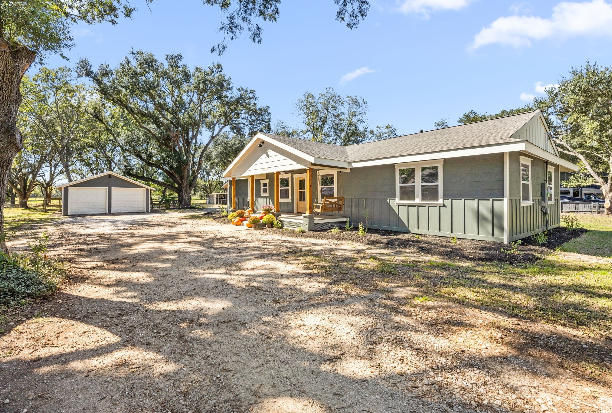 2693 Fairview Road Alvin, TX 77511 - Photo 2 of 49 a front view of a house with a yard