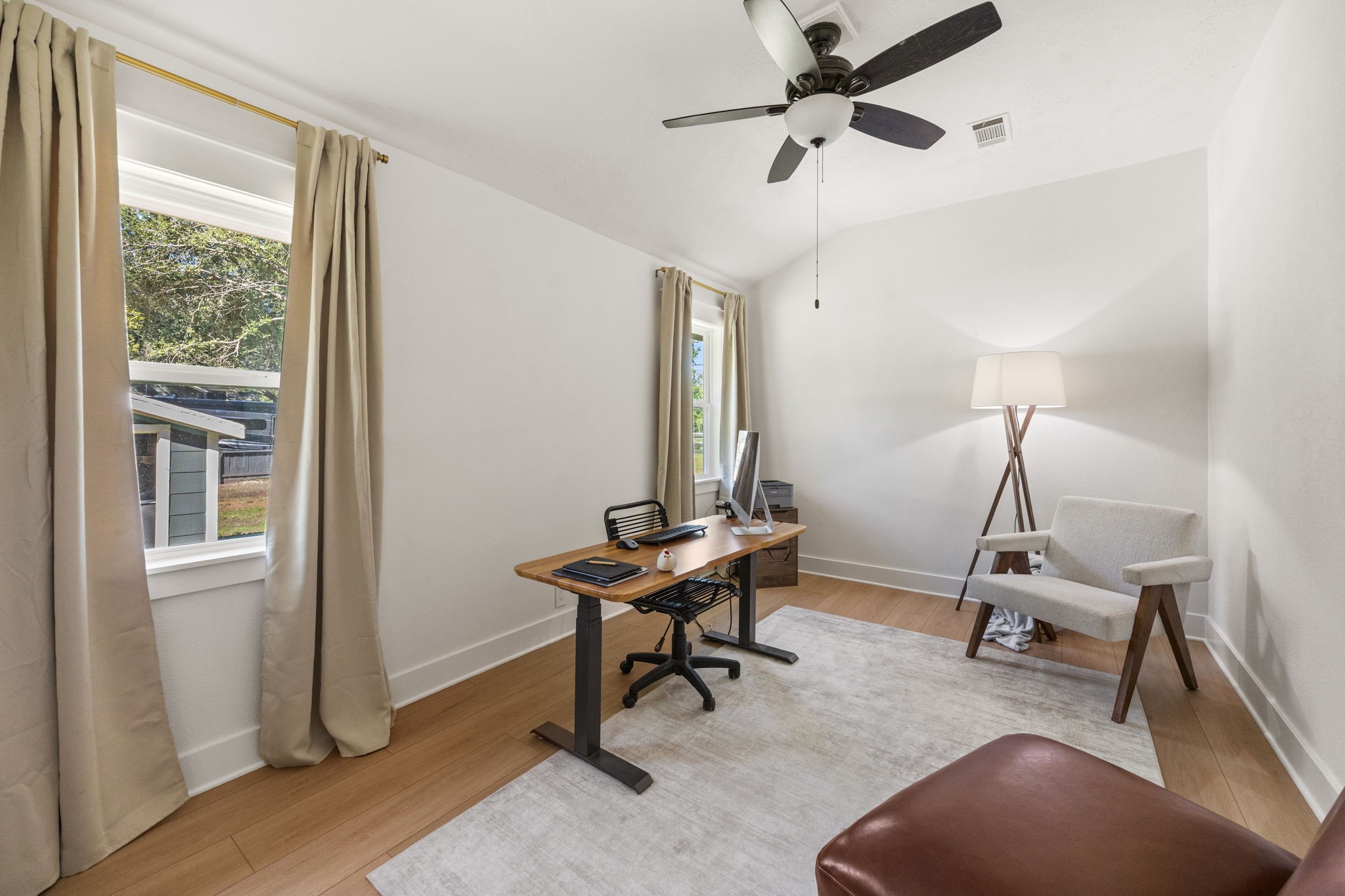 2693 Fairview Road Alvin, TX 77511 - Photo 21 of 49 a room with gym equipment and windows