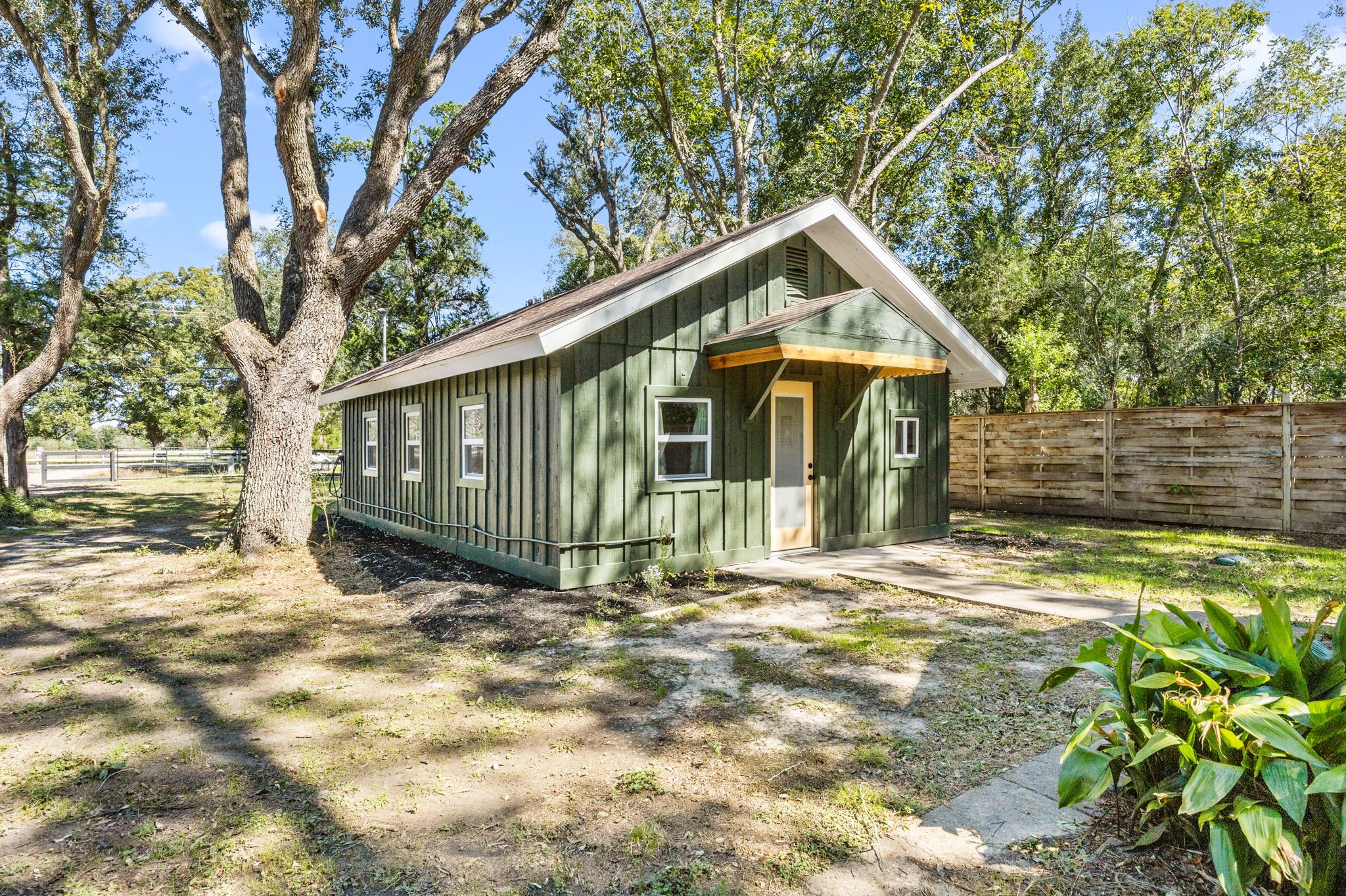 2693 Fairview Road Alvin, TX 77511 - Photo 26 of 49 a view of a house with a yard