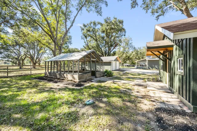 a view of yard with tree s