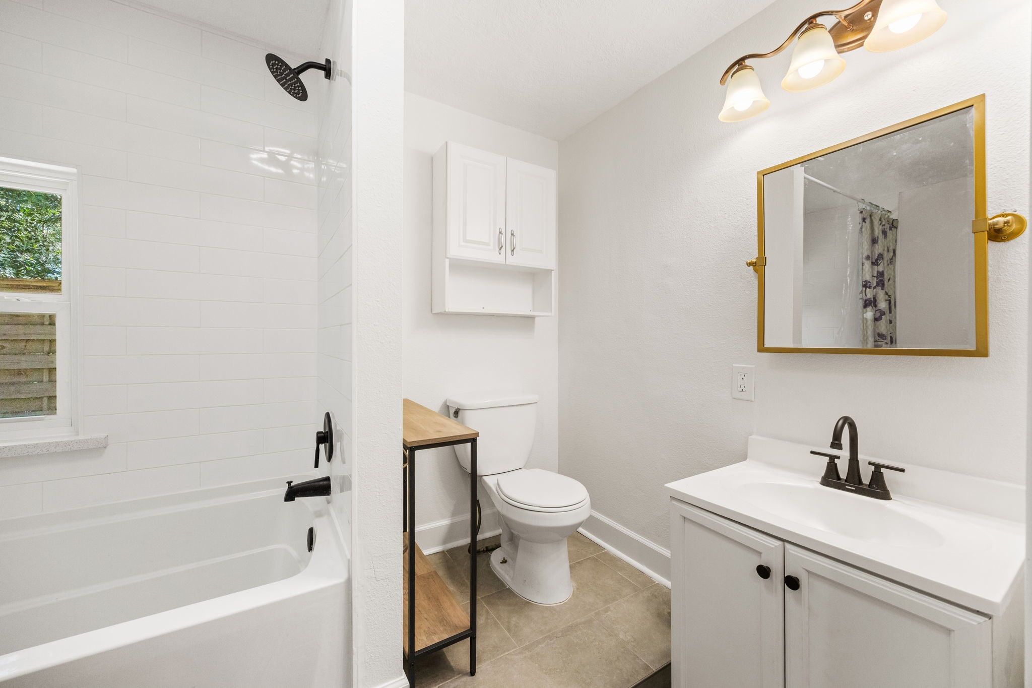 2693 Fairview Road Alvin, TX 77511 - Photo 33 of 49 a bathroom with a sink toilet and shower