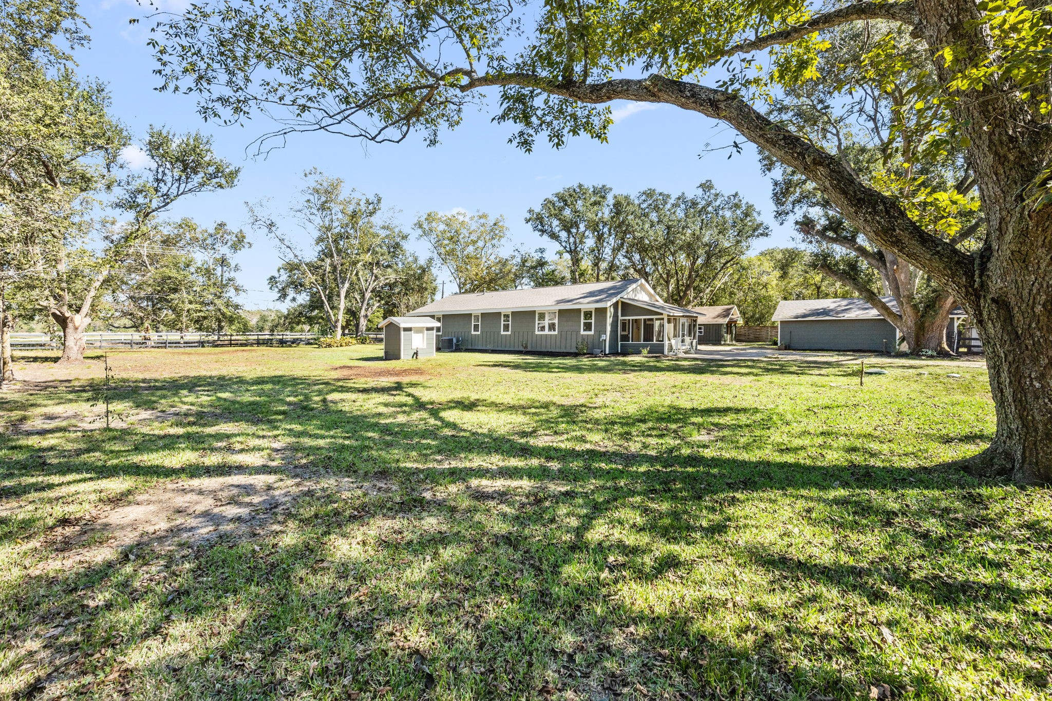 2693 Fairview Road Alvin, TX 77511 - Photo 36 of 49 a view of a lake with houses in the back