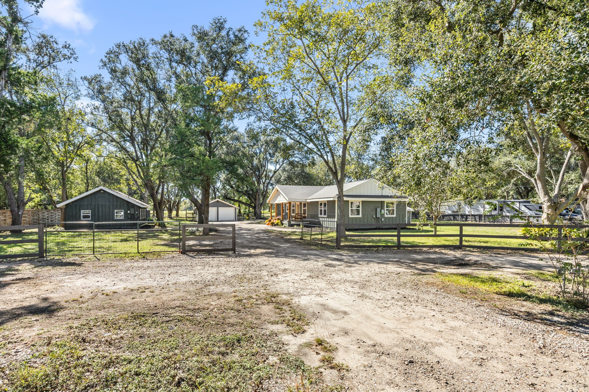 2693 Fairview Road Alvin, TX 77511 - Photo 43 of 49 a view of a house with swimming pool and sitting area