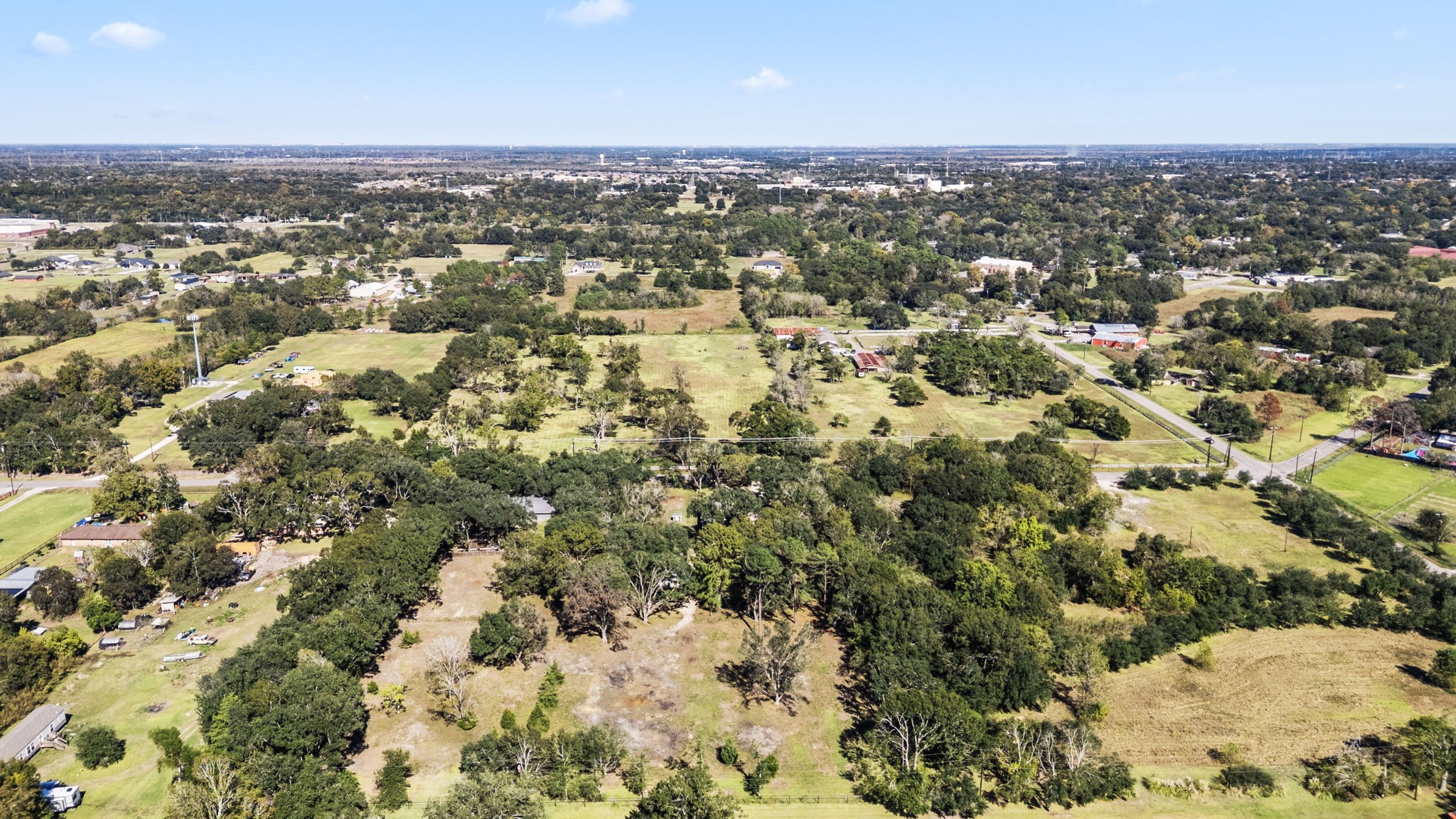 2693 Fairview Road Alvin, TX 77511 - Photo 48 of 49 an aerial view of residential houses with city view