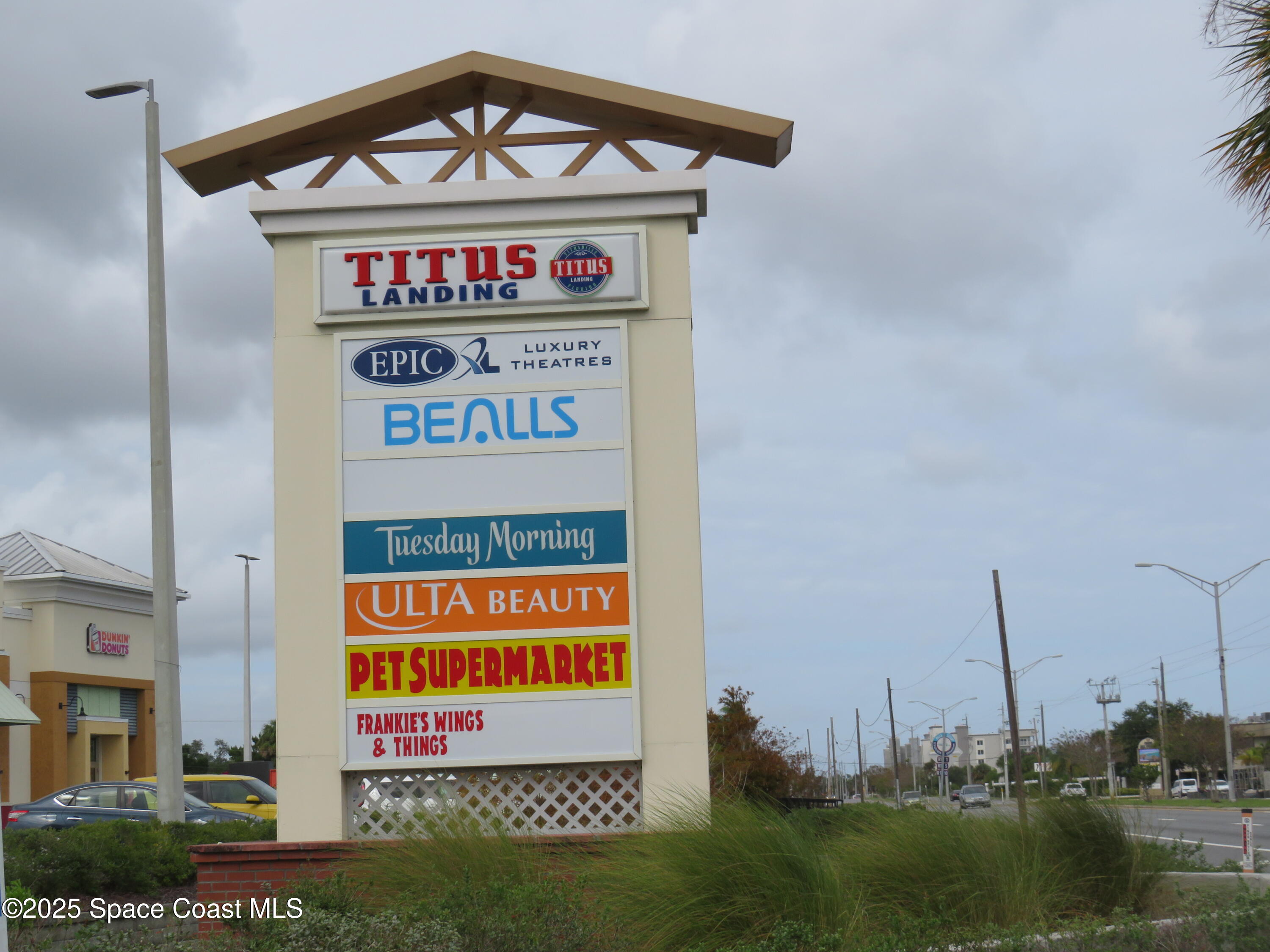 3548 Loggerhead Lane Mims, FL 32754 - Photo 22 of 25 a sign board with a play ground in the back