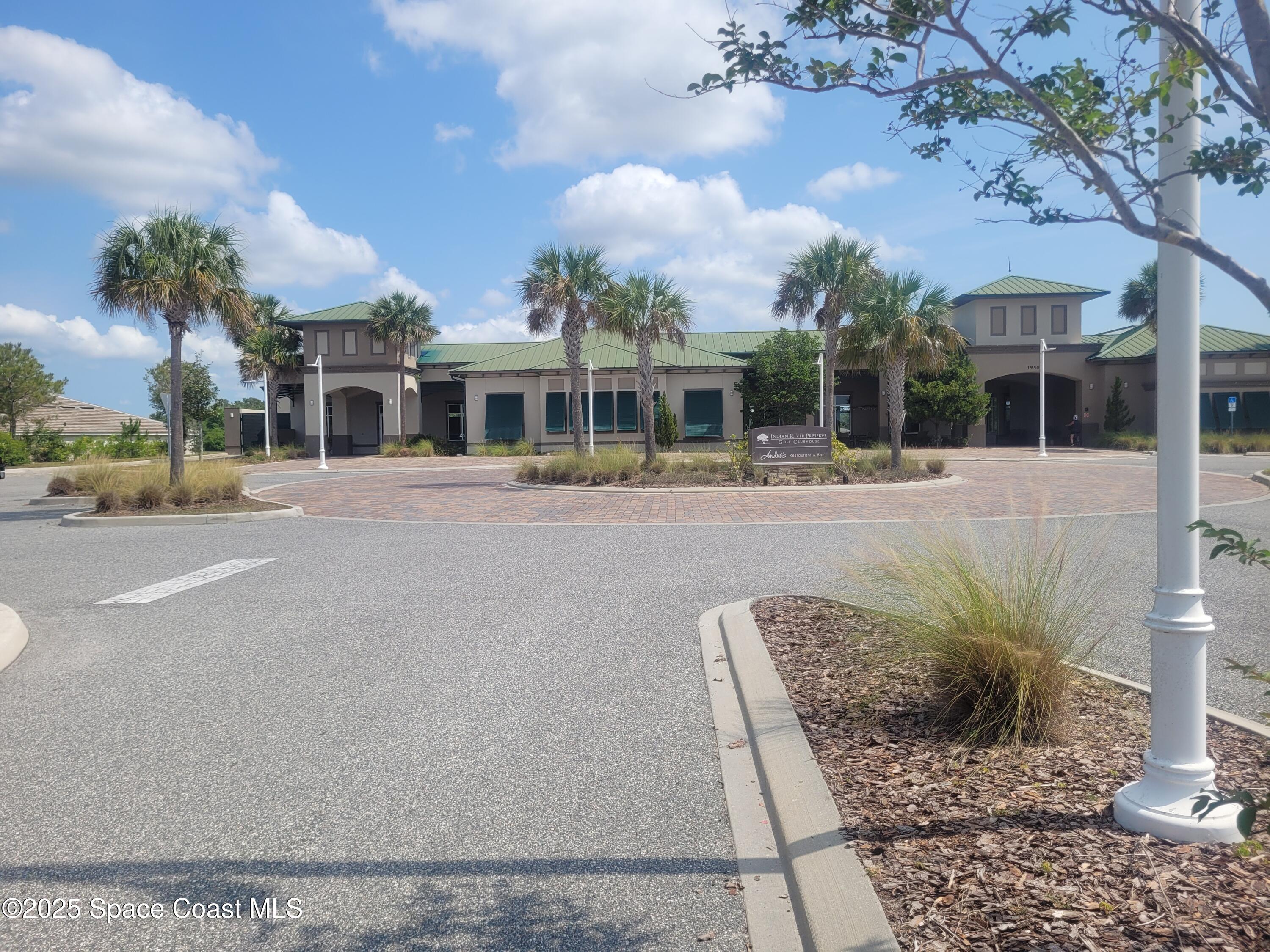 3548 Loggerhead Lane Mims, FL 32754 - Photo 3 of 25 a front view of a house with a yard and potted plants